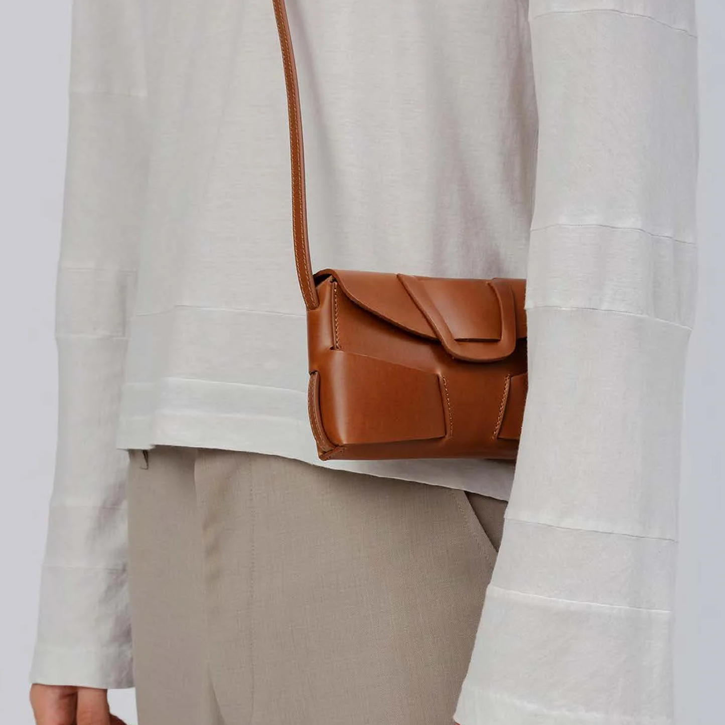 Warm Chestnut Brown Layered Geometric Slim Rectangular Mini Carry Pouch With Shaped Front Tab And Single Slim Hanging Carry Cord