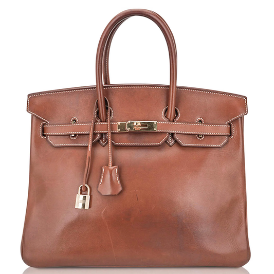 Warm Sunbaked Tan Organic Tonal Generous Sized Structured Hand Tote With Pale Contrast Stitching, Luminous Golden Twist Lock Hardware And Coordinating Tan Suspended Metal Padlock Charm