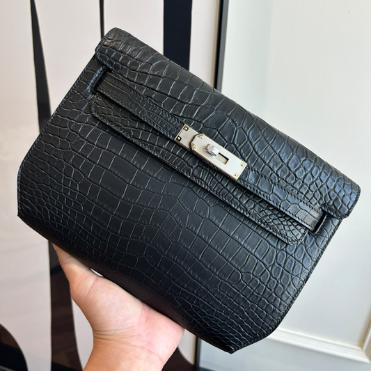 Glossy Jet Black Distinct Raised Scaled Slim Flat Rectangular Clutch Pouch With Stone Accent Silvery Twist Lock Hardware And Side Carry Fixture Tabs
